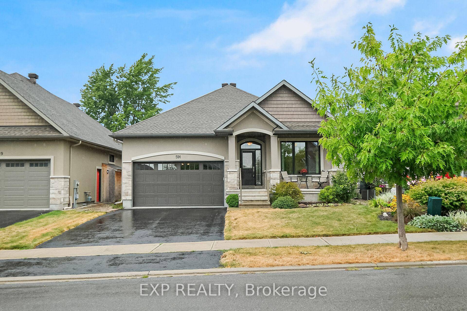 Welcome to 591 Robert Hill Street, a beautifully crafted custom home in the sought after Riverfront Estates community.