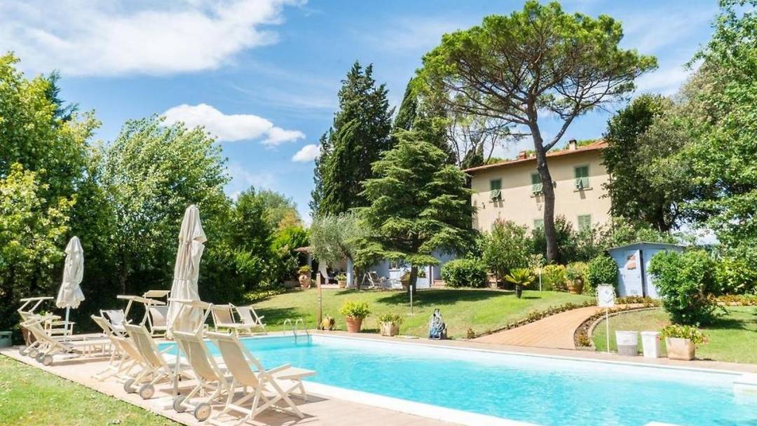 Restored early-1900s villa near Florence with 16 suites, guest house, heated saltwater pool, landscaped gardens, and premium amenities.