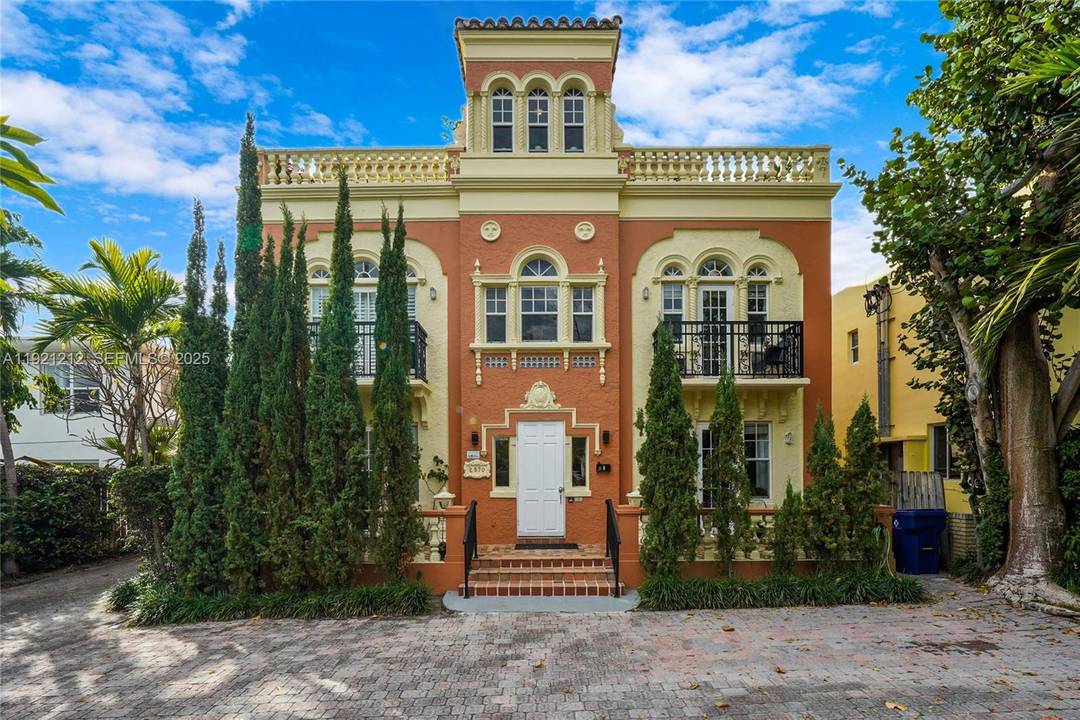 Unique boutique style building featuring charming Spanish architecture.