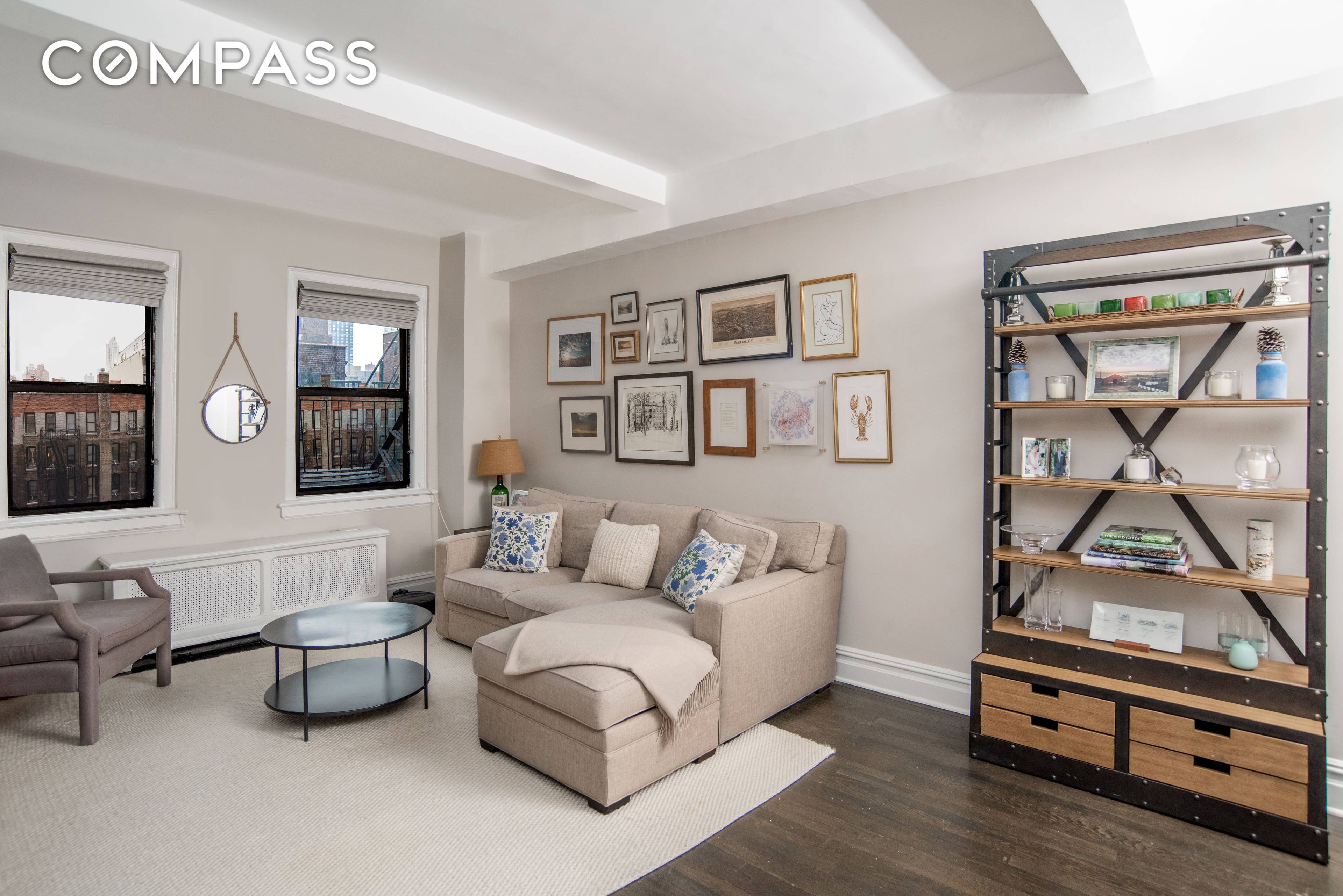 THE APARTMENT Apartment 8F is a sophisticated two bedroom, one bathroom with high ceilings and charming prewar details.