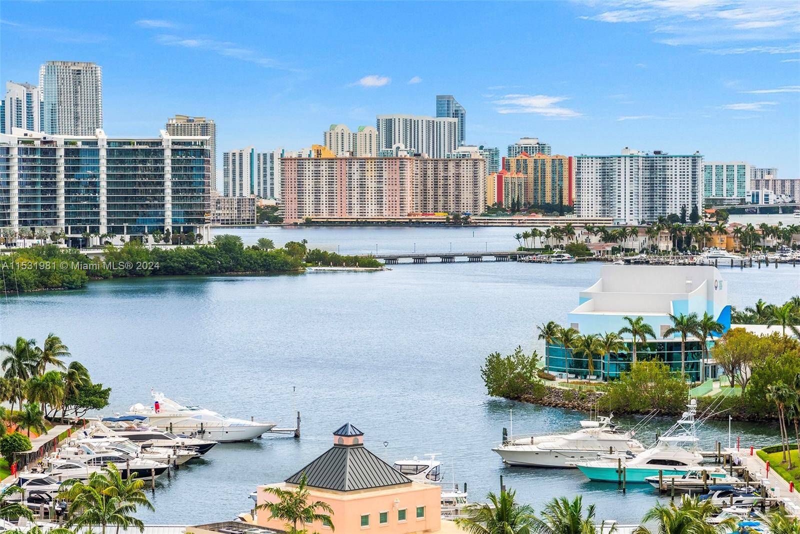 Experience stunning golf and water vistas from this remarkable corner apartment located in the vibrant heart of Aventura.