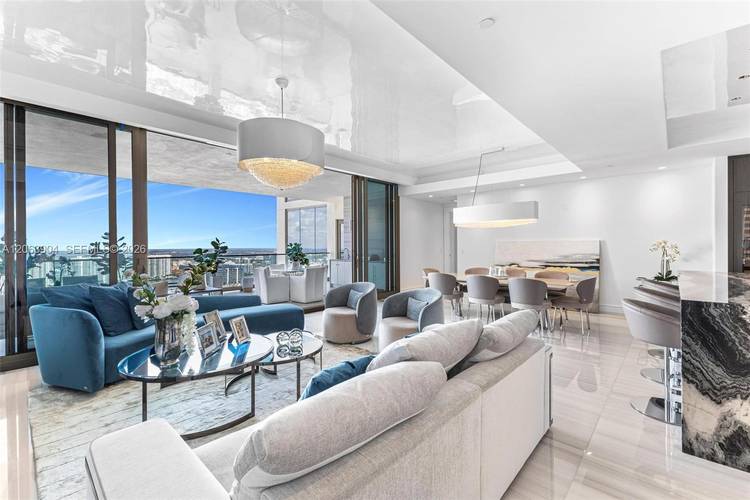 Experience refined coastal living in this exceptional 3 bedroom plus den, 4.
