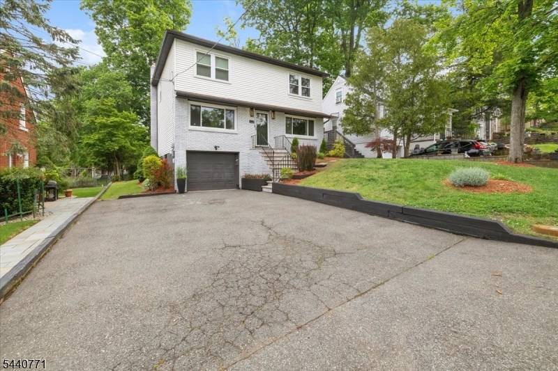 Thoughtfully renovated from top to bottom, this elegant 3 bedroom, 3.