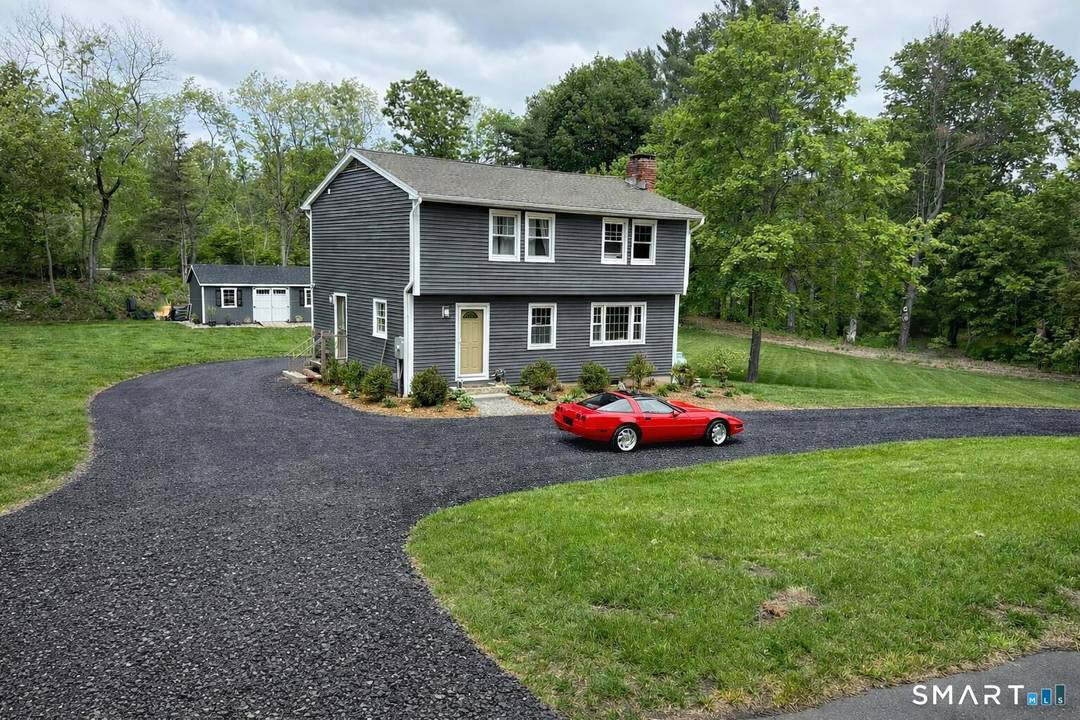 Updated 3 bdrm, 3 bath colonial including master bath, with open concept, hardwood floors throughout, kitchen with an island, and new Kitchen Aid appliances on 1 level acre.