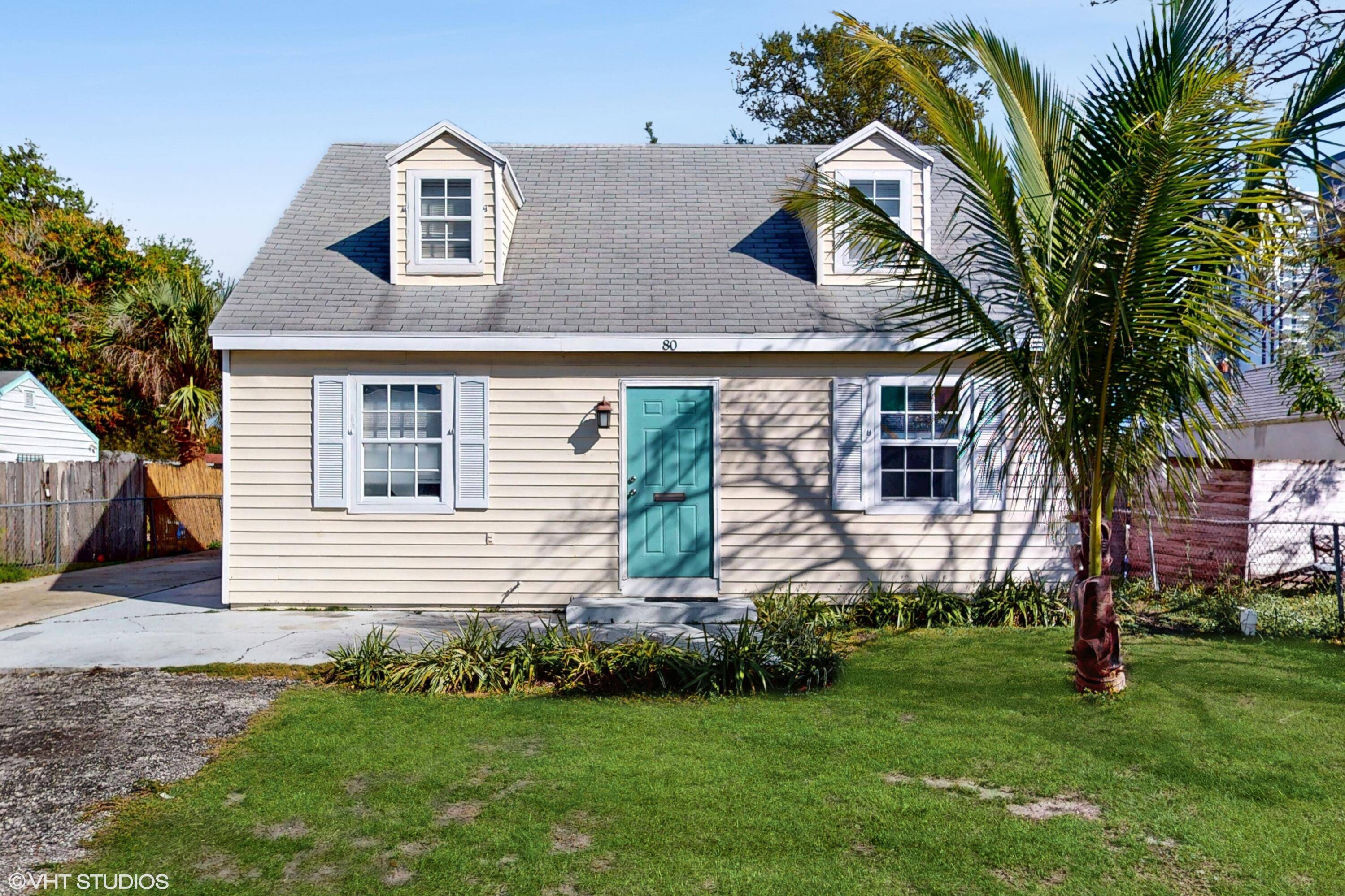 Sweet Cottage style home with master bed sitting area upstairs, 2 beds down, hardwood laminate floors, large great room with dining area that opens to a huge back patio porch ...