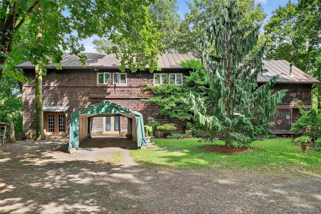 Step into this one of a kind, converted barn where where rustic charm meets historic character just minutes from the charming Village of New Paltz.