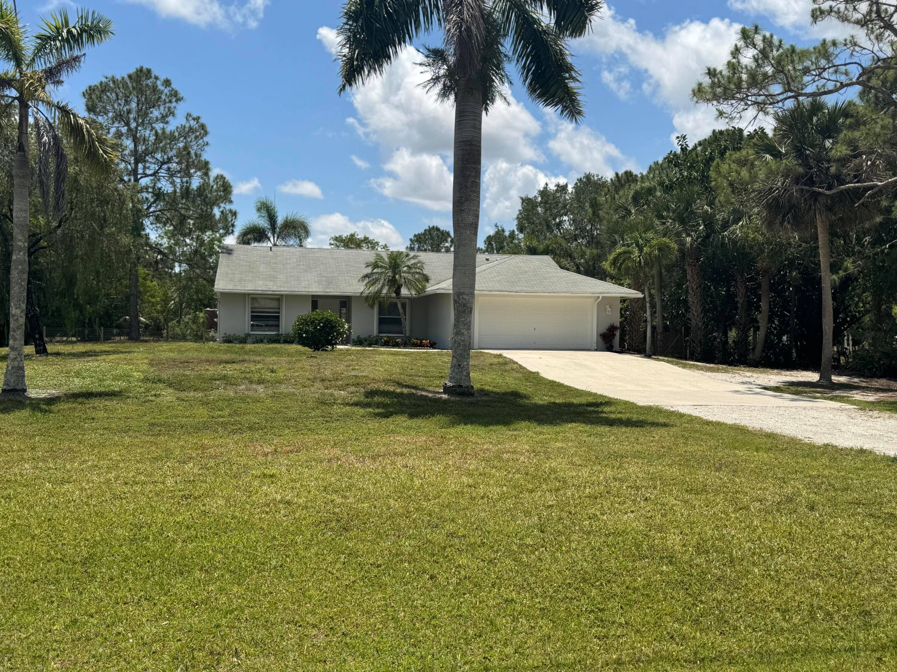 MOVE IN TO THIS 4 2 2C CBS HOME WITH A 3 WAY SPLIT, TILED THRUOUT, FRESHLY PAINTED INSIDE AND OUT, BATHROOMS PARTIALLY REMODELED, NEW REFRIGERATOR AND MICROWAVE, ACCORDIAN SHUTTERS ...