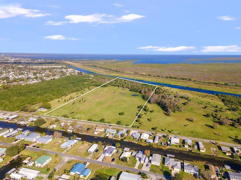 Undeveloped 19. 85 acre parcel with access to Lake Okeechobee.