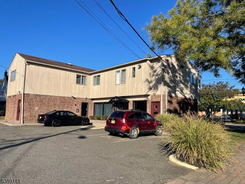 PRIME LOCATION RETAIL STORE with TWO 2 BR APARTMENT UNITS !