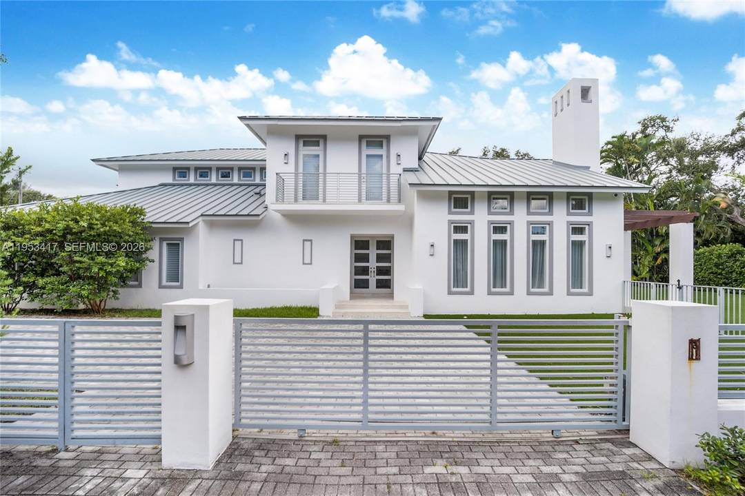An exceptional executive home perfectly located in South Gables on a fully gated 15, 000 sqft lot.