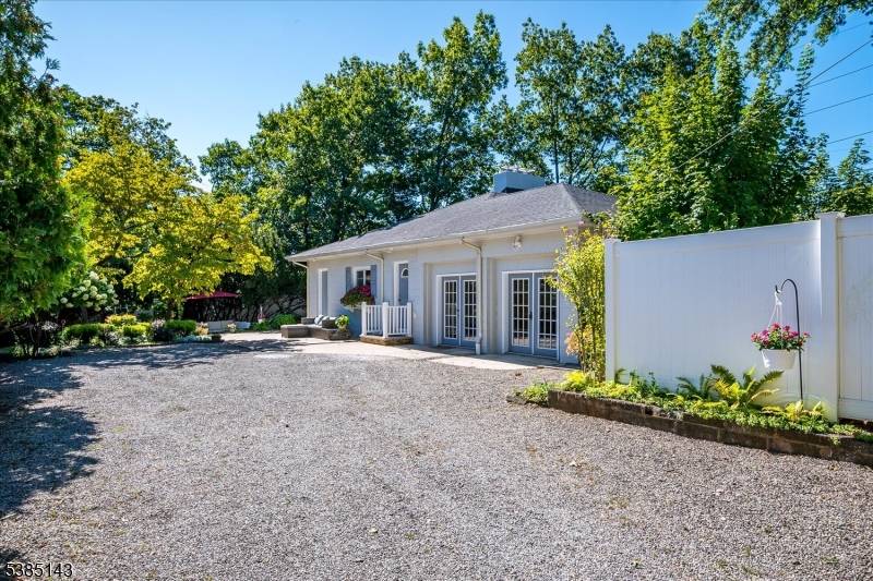 This fully renovated Mid Century Modern ranch is a true hidden gem, tucked away off a quiet cul de sac.
