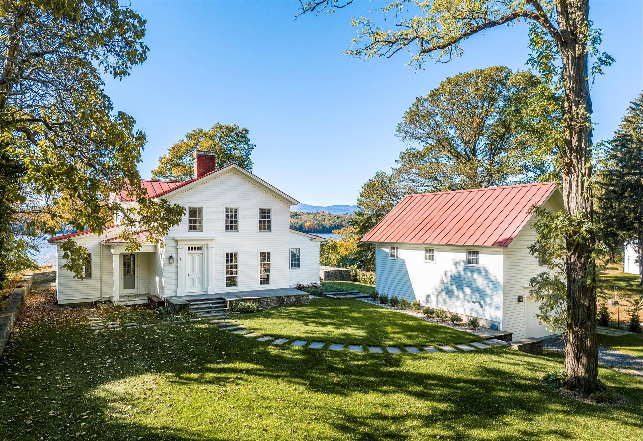 Enjoy stunning Catskill Mountain and Hudson River views and water access from this gracious 4 bed, 3 bath home in the heart of the Hudson Valley.