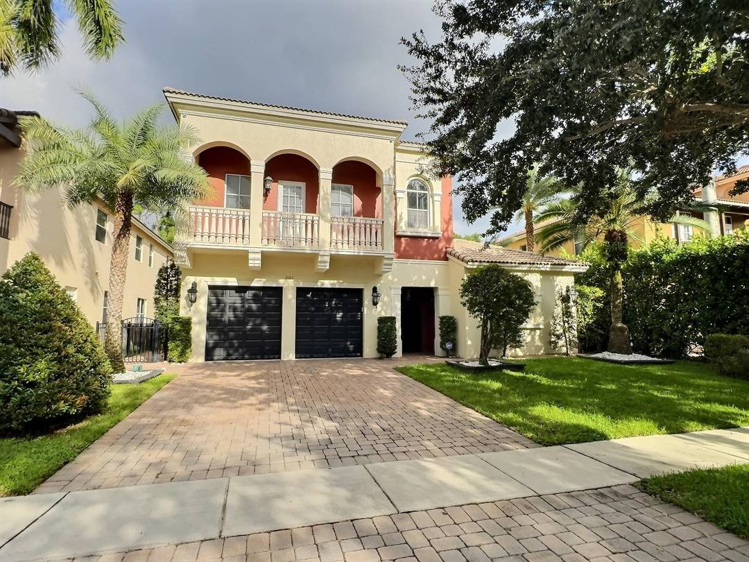Price Improvement ! Elegant Mediterranean Courtyard Style Pool Home in Worthington Estates, West Palm Beach !