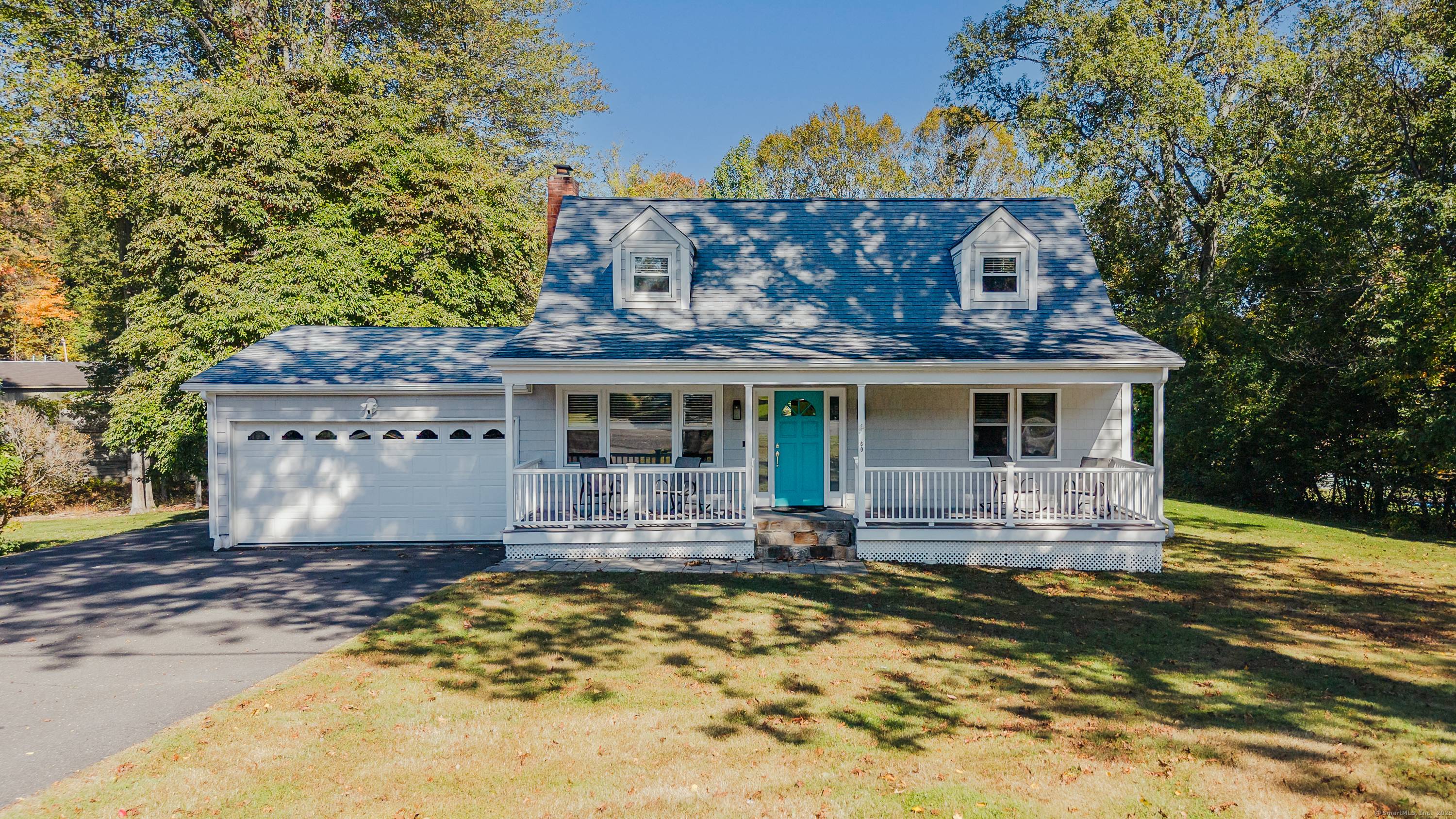 Welcome to 60 Lillian Drive a beautifully updated oversized Cape Cod that perfectly blends elegance, comfort, and family living.
