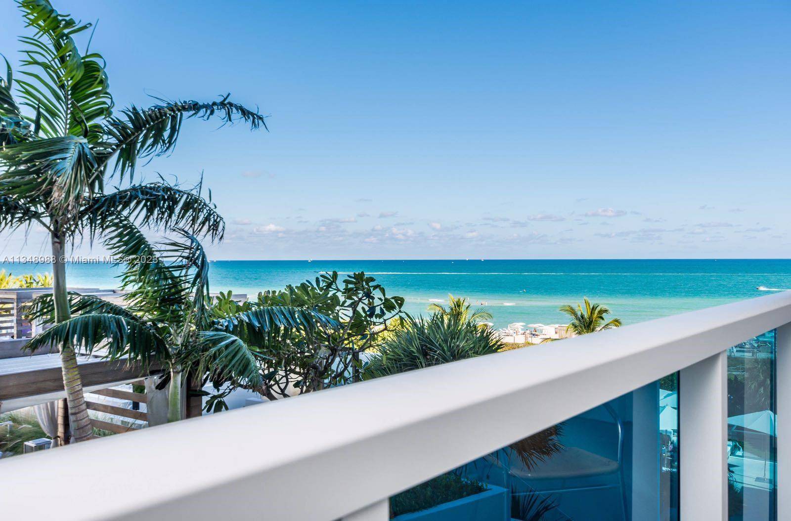 Modern oceanfront studio with a private balcony, offering stunning views of the 1 Hotel pool and ocean.