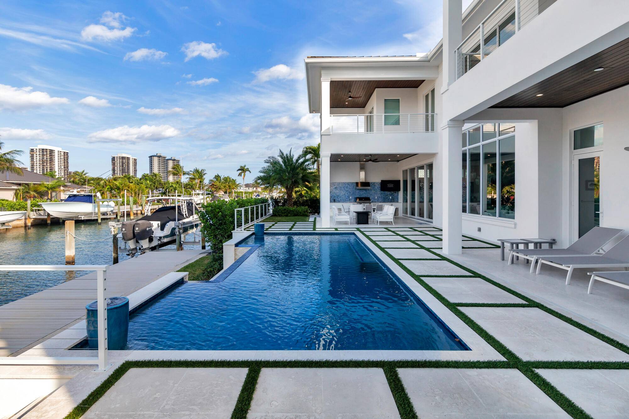 This breathtaking two story modern residence, completed in 2023 is situated on a 100x110 lot with 100 feet of waterfrontage.