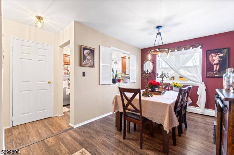 Move right into this stylish first floor unit featuring a modern kitchen with granite countertops, stainless steel appliances, updated bathroom, and new flooring throughout.