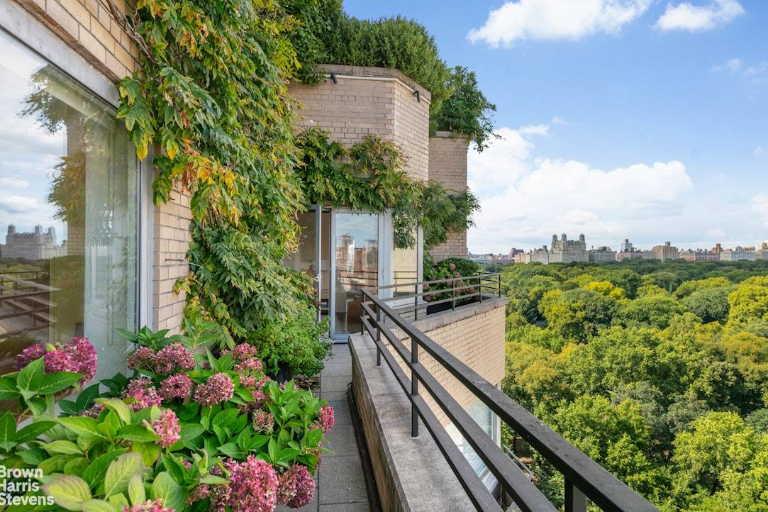 Perched atop 936 Fifth Avenue, this recently updated three bedroom penthouse is a true gem, offering unparalleled Central Park vistas and an abundance of natural light.