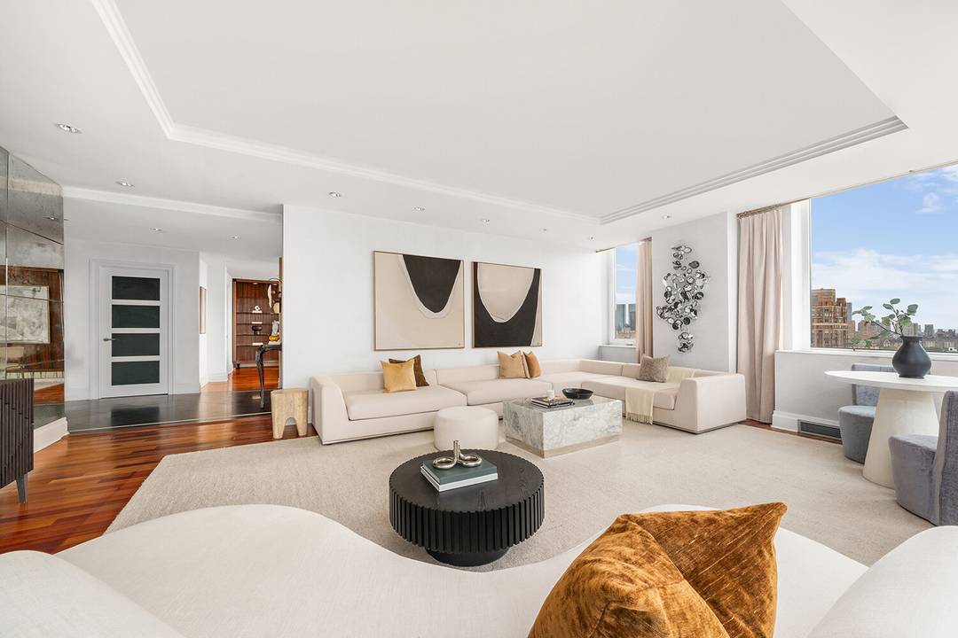 Elegant, Expansive, and Elevated Nearly 3, 300 Sq Ft at The Seville Condominium A truly remarkable residence awaits on the 30th floor of The Seville Condominium an iconic Robert A.