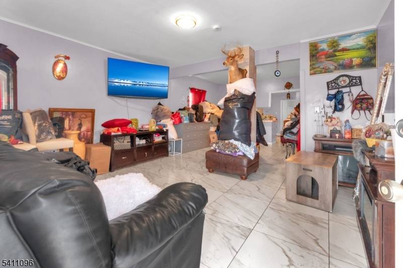 Fully Renovated 3 Story home, newly painted and tile throughout.