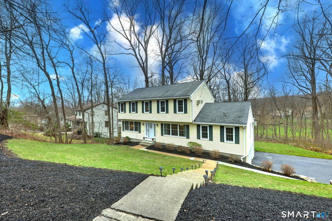 Set on the 5th fairway of the Whitney Farms Golf Course is where you will find this 3 bedroom, 3 1 2 bath colonial.