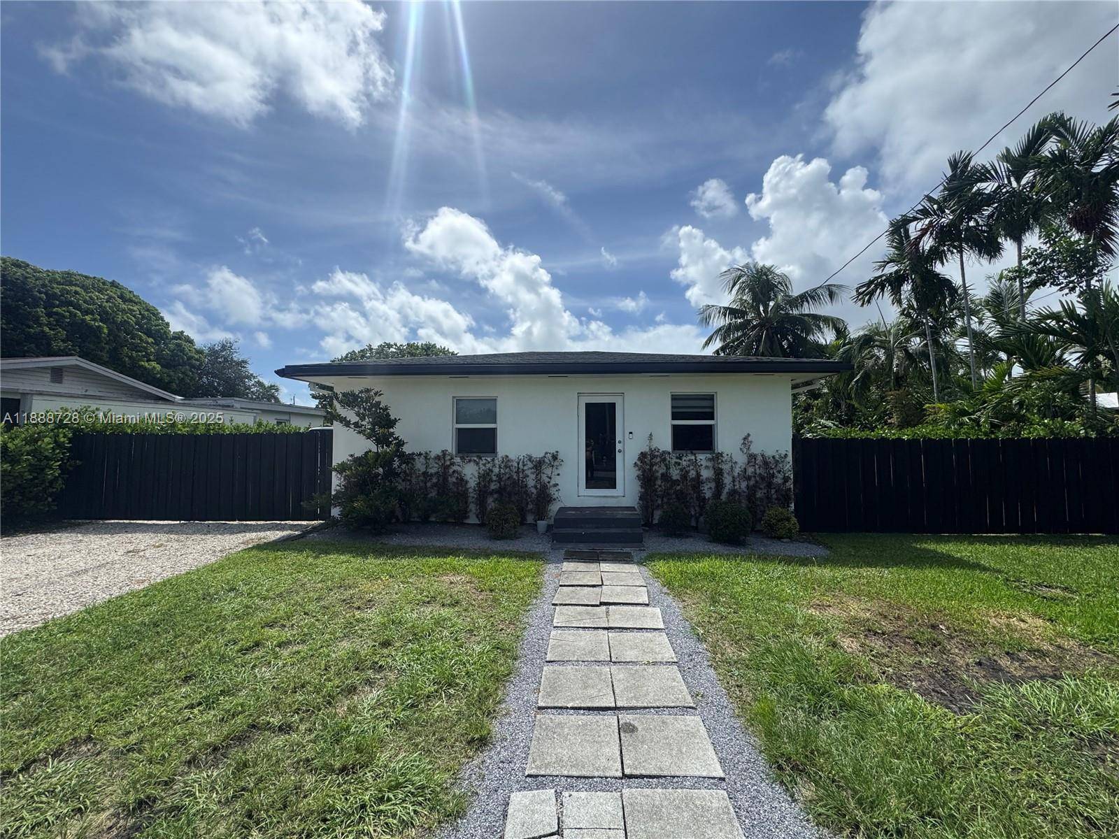 Recently renovated 2 bedroom, 1 bath home in Palmetto Bay featuring a new roof, wood laminate flooring, impact windows and doors, new blown insulation in attic, and upgraded closets.