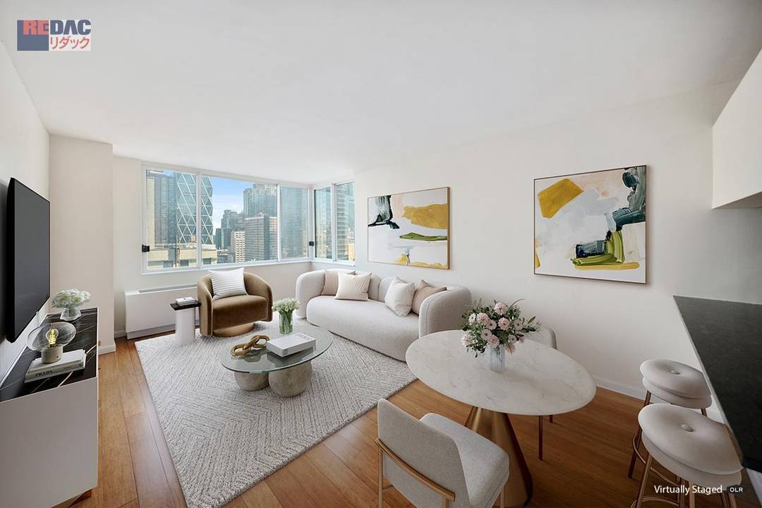 Beautifully renovated high floor 1BR at Worldwide Plaza featuring sweeping open skyline views toward Columbus Circle and Billionaires Row, enhanced by surrounding low rise buildings.