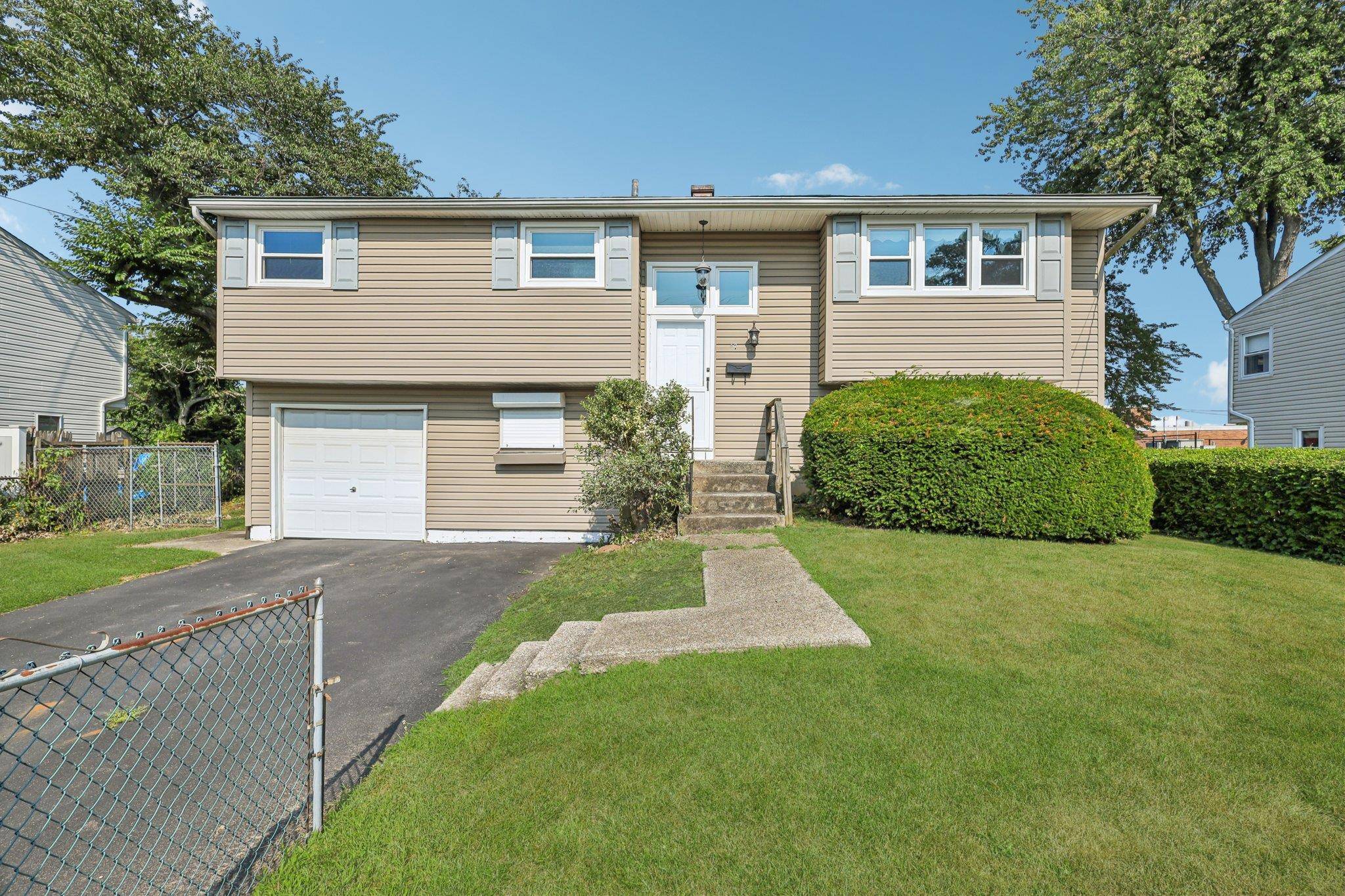 Welcome to 47 Owens a well maintained hi ranch and inviting home offering updates throughout.