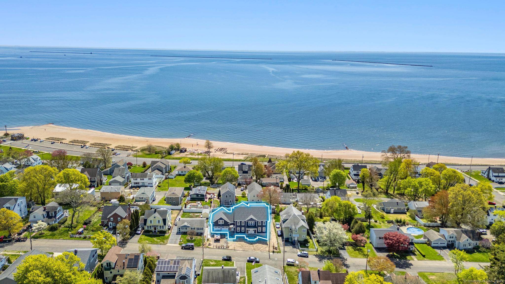 Welcome to a stunning, custom built Colonial in the heart of West Haven's waterfront community.