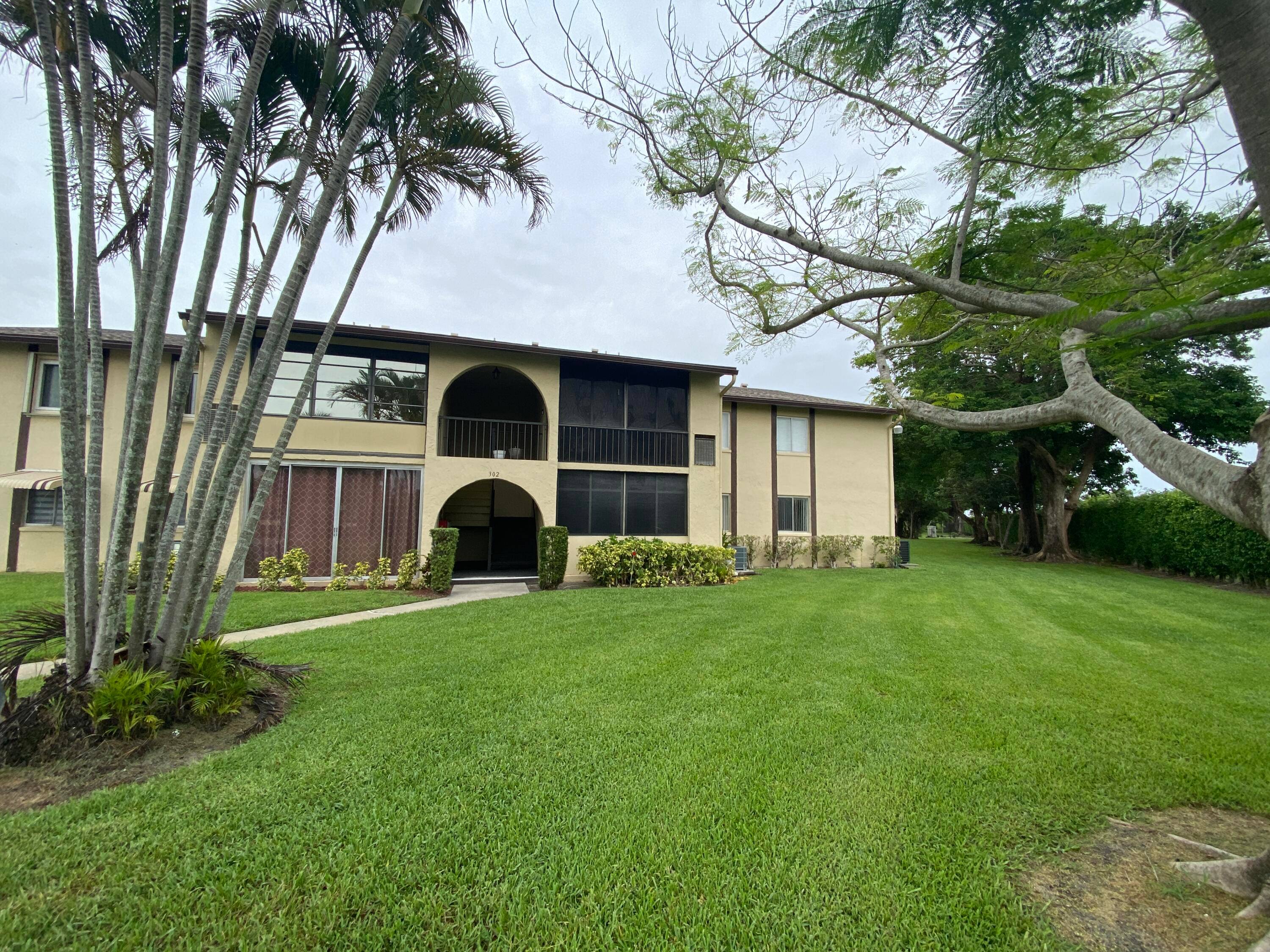 Quaint 1st floor corner unit with garden views from all windows.