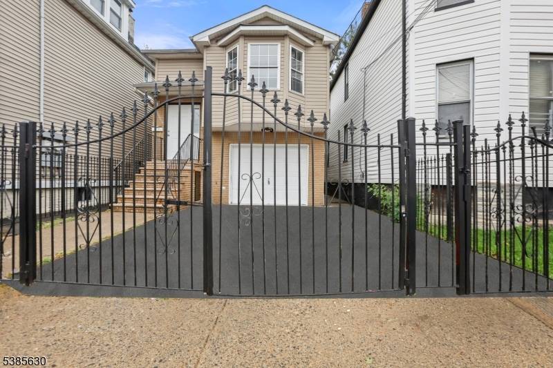 Welcome to 262 S 19th Street, a renovated two family home in Newark offering modern updates and excellent investment potential.