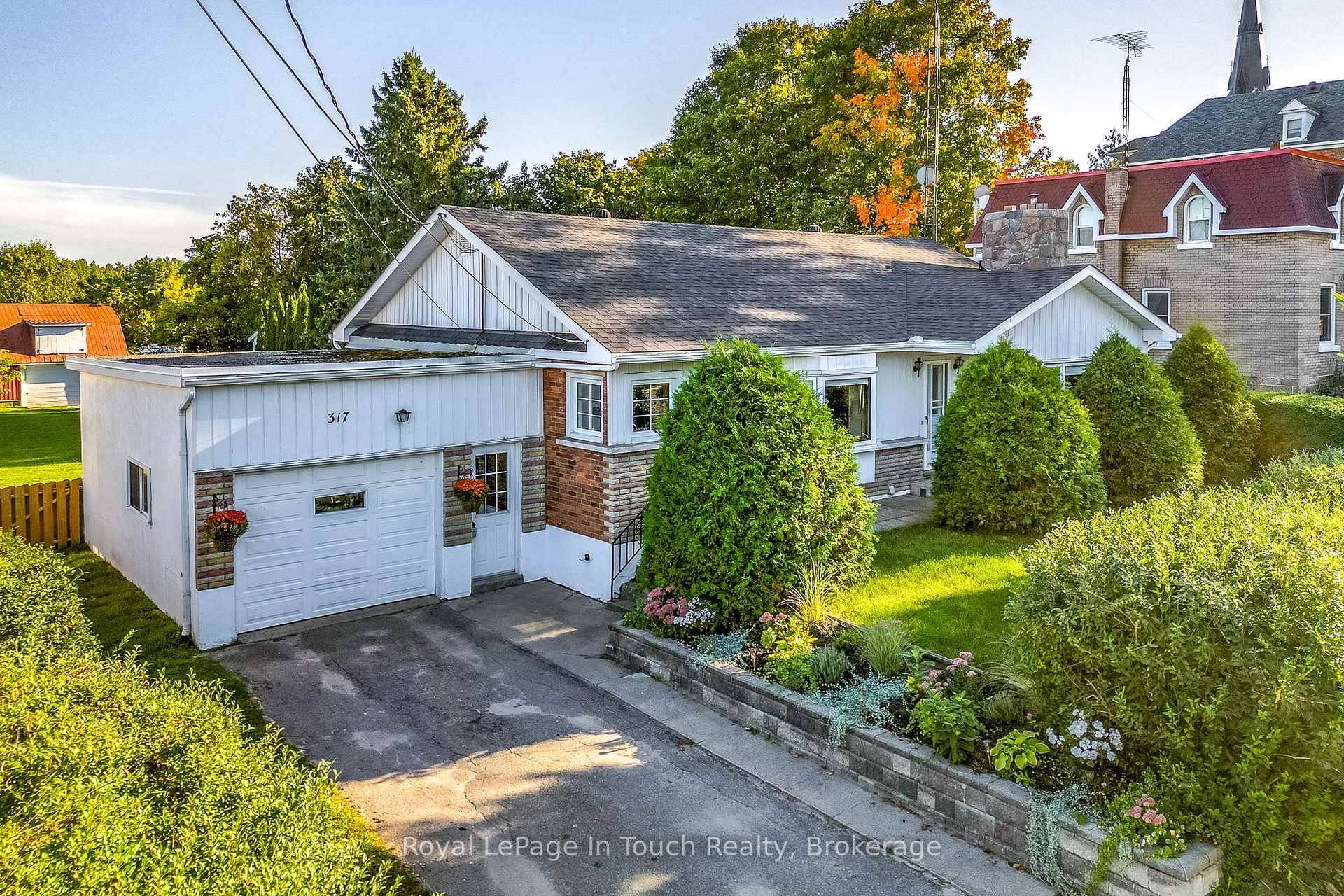 Welcome to 317 Lafontaine Road West, a bright and welcoming brick bungalow on a generous lot in the heart of the Lafontaine community, and just minutes from the sandy shores ...