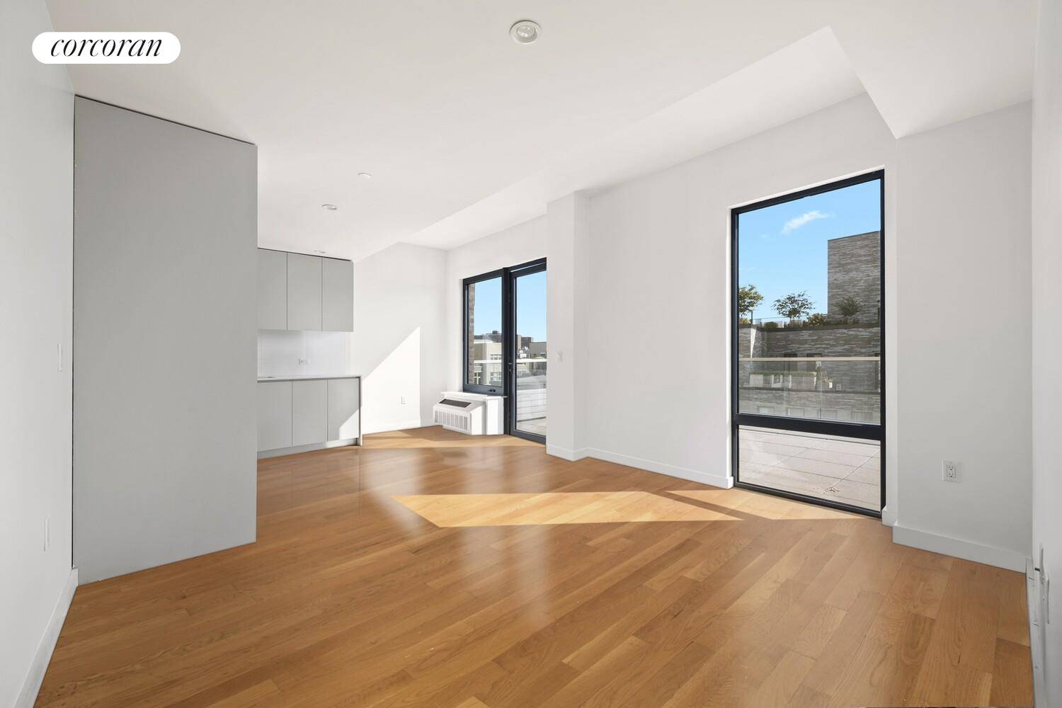 This extra spacious home features a large living space, plus floor to ceiling windows allowing for open views and great sunlight.