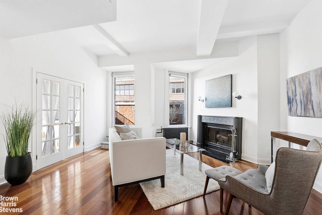 Rare High Floor Pre War One Bedroom Two Bathroom with Fireplace Boasting Terrace and Striking Views in NoMad This rarely available NoMad loft home suits the discerning eye meeting all ...