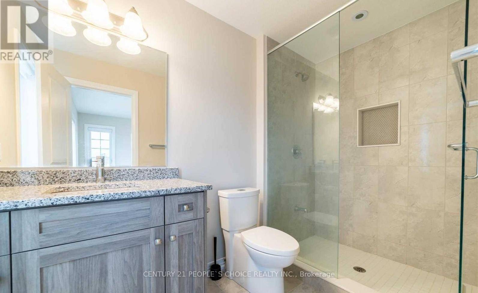 Welcome to Magnificent Monarch Woods, a stunning corner unit townhome in the highly sought after Doon South community, backing onto lush greenspace and filled with natural light.