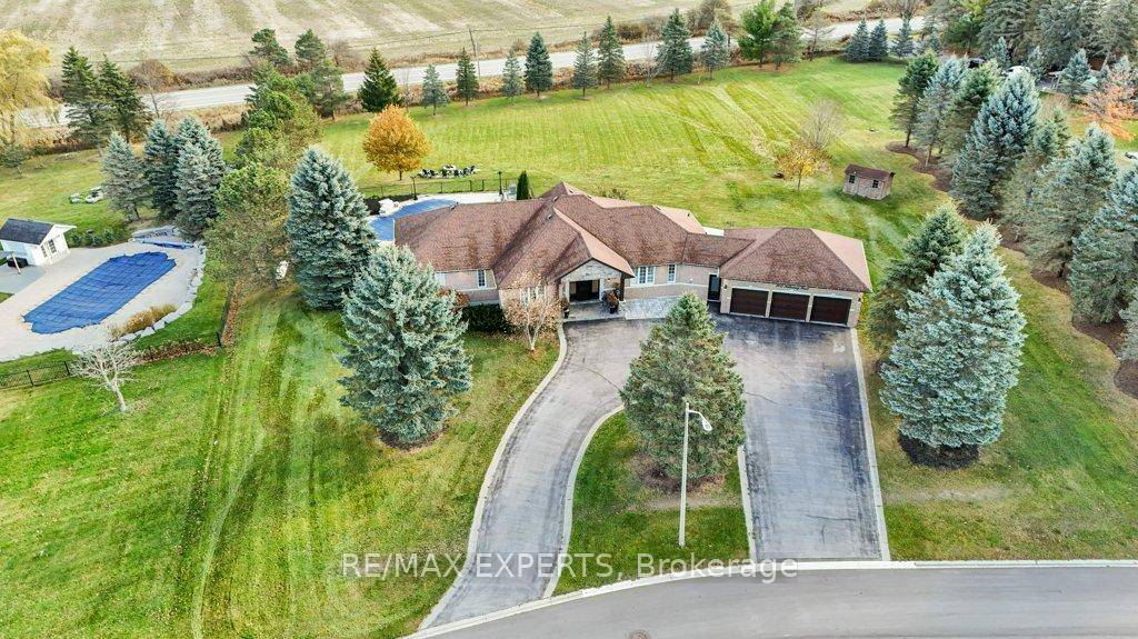 This luxury estate lot features 4 bedroom, 4 bathroom bungalow offers approx 5, 200 sq.