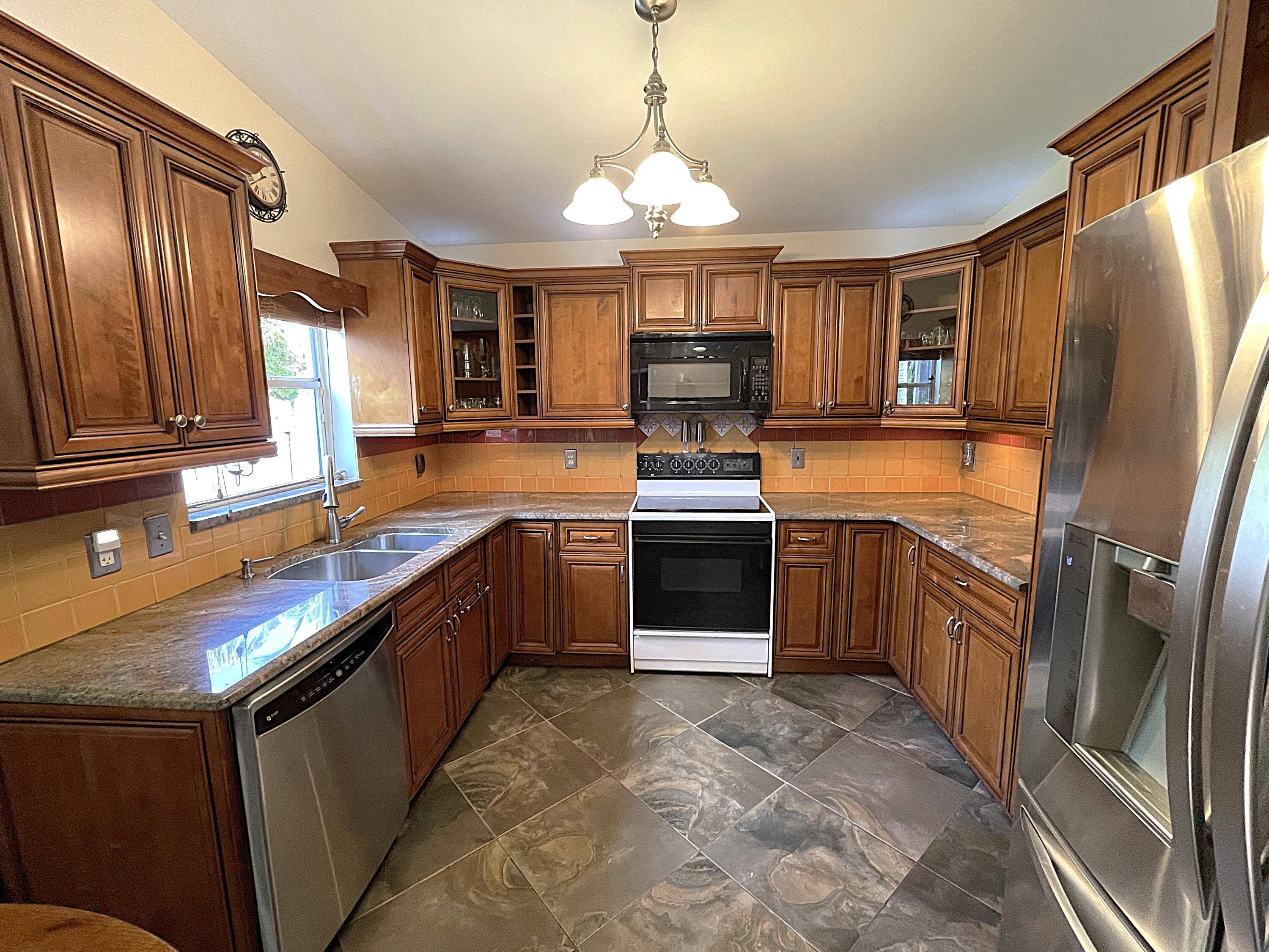 Rarely available single family home with NO HOA and a newer roof !