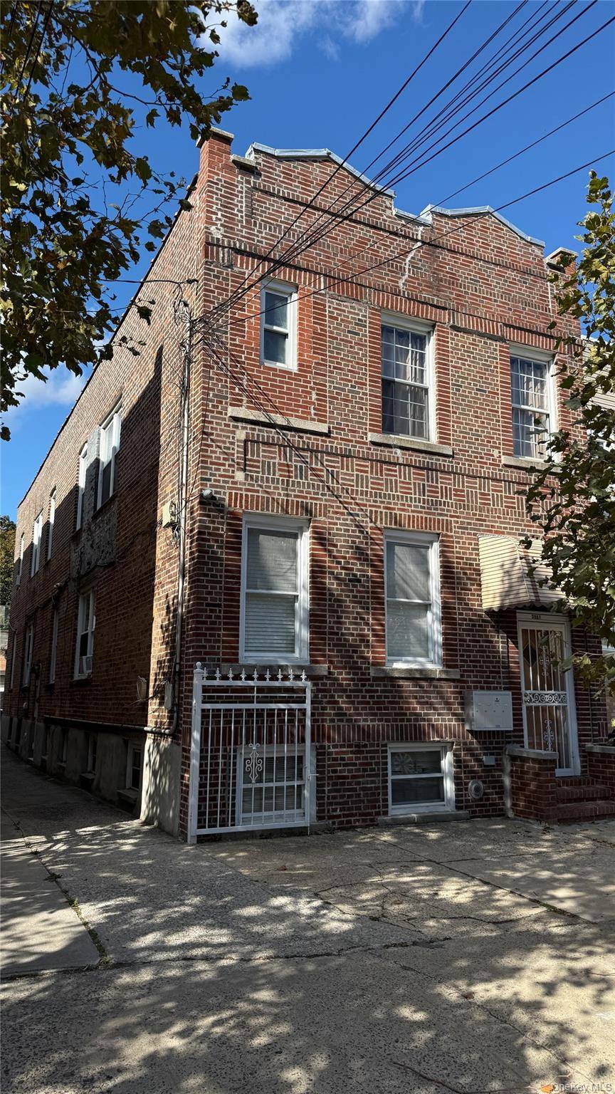 This classic detached brick three family home offers solid prewar construction, well preserved interior details, and updated living spaces across three income producing units.