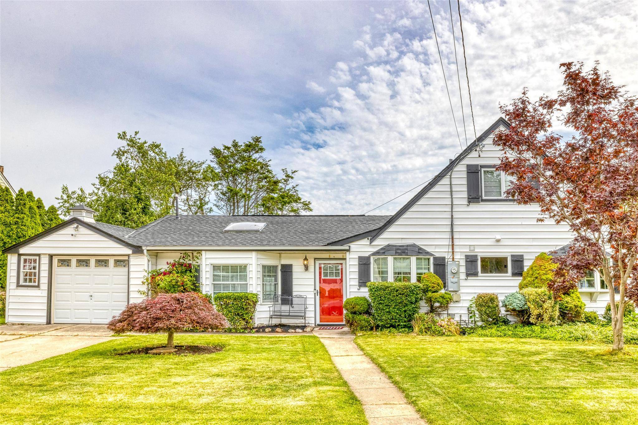 Welcome to this Beautiful, Sun Drenched spacious bright home completely renovated Expanded Cape perfectly located in the McVey section of East Meadow.