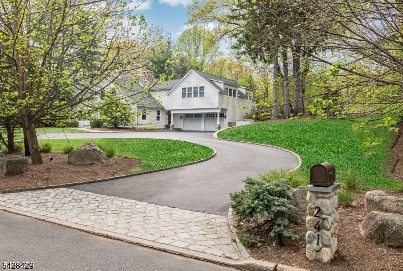 Originally built in 1826 and masterfully expanded and renovated, this exceptional Ramsey estate blends timeless character with sought after amenities on 1.