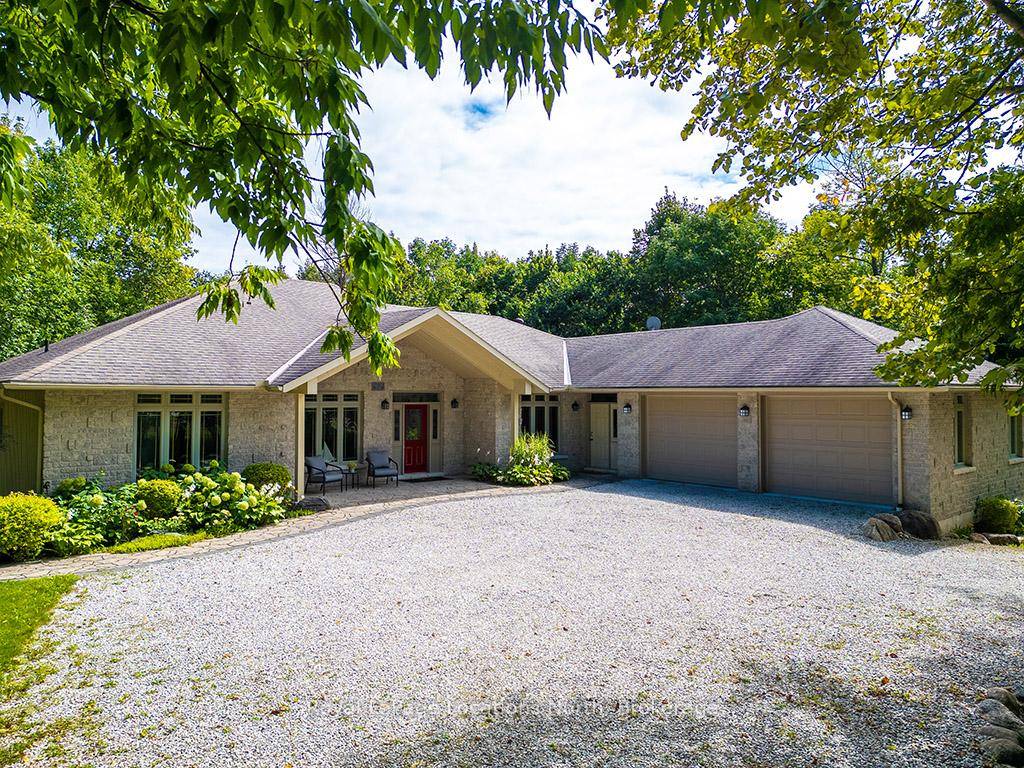 A country retreat with the privacy of a 2 acre lot nestled in the trees less than a 10 minute walk to the water and less than a 10 minute ...