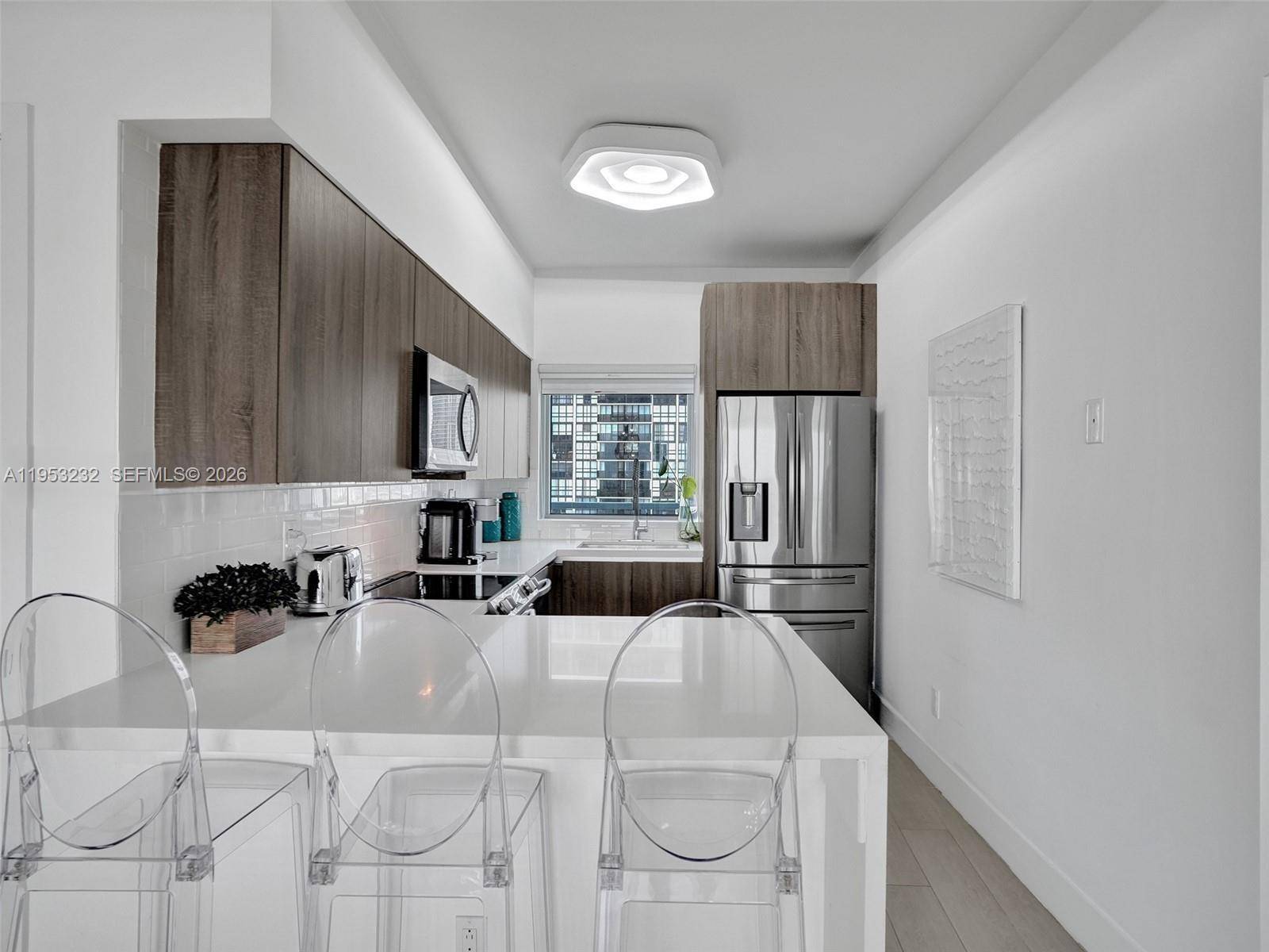 Immaculate and impeccably maintained 2 bedroom, 2 bath residence showcasing breathtaking bay and sunrise views.