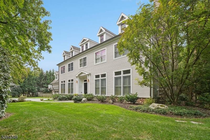 STUNNING COLONIAL AMAZING DEERFIELD LOCATION This modern Short Hills Colonial blends timeless elegance with contemporary new construction luxury, featuring high ceilings, designer finishes and an effortless, open floor plan.