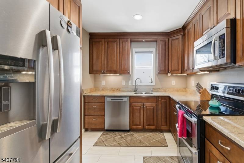 Welcome to this bright and inviting 4 bedroom, 2 full bath Bi level home set on a generous corner lot with a spacious, sun filled backyard.