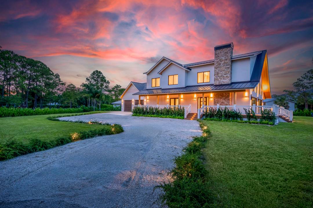 Welcome to a stunning fusion of modern luxury and farmhouse charm, nestled in the heart of Jupiter Farms.