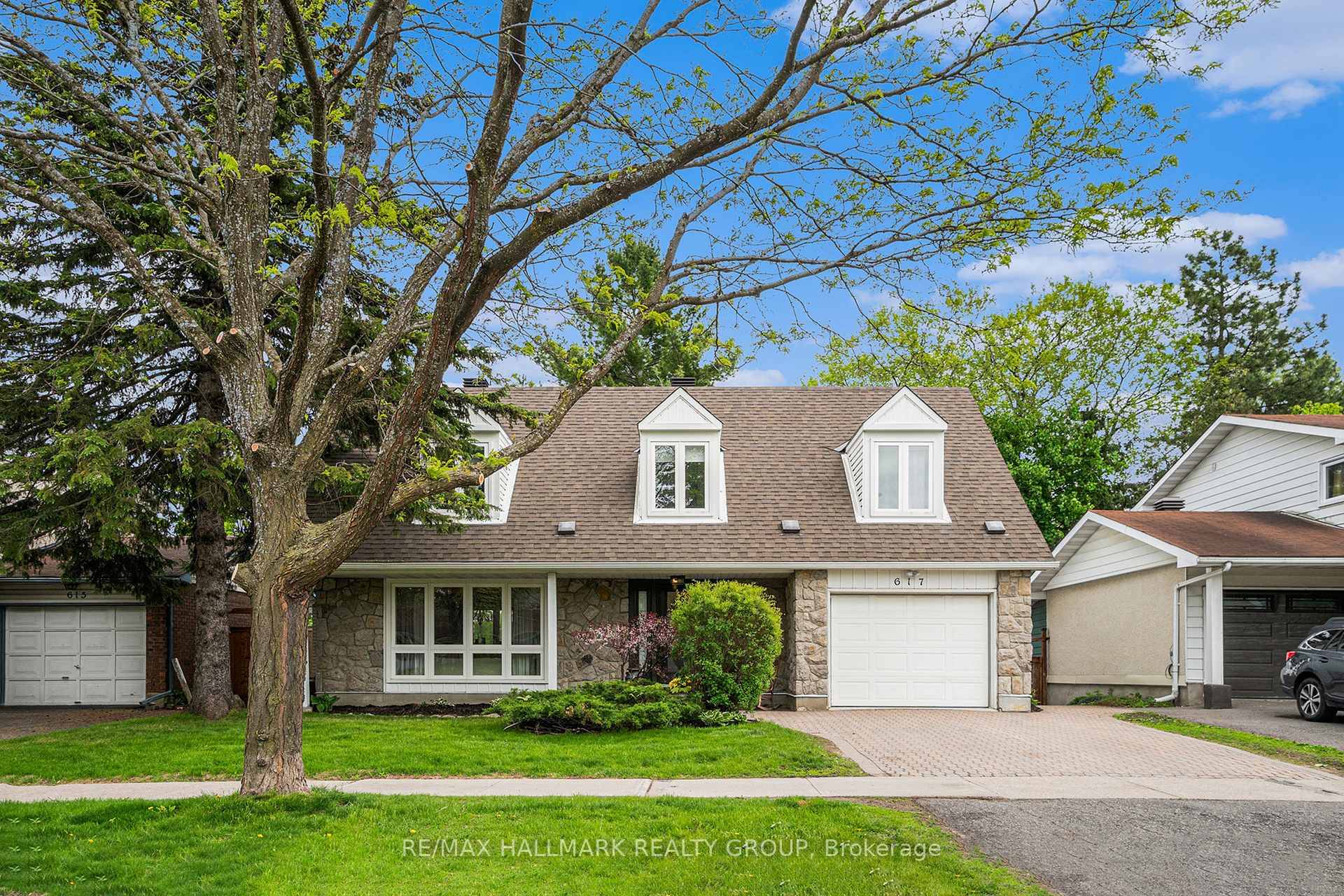 617 La Verendrye Drive enjoys a private backyard gate, freeing the children to run into the lush green open spaces of La Verendrye Park, which lies right in the heart ...