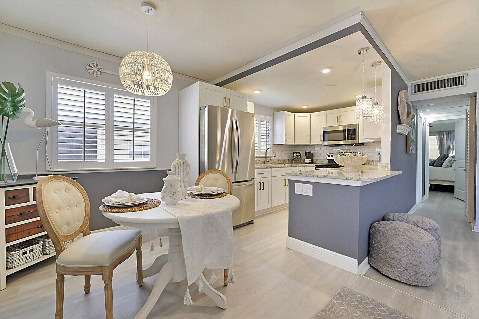 Coastal charm meets carefree living in this fully updated 2BR 2BA second floor condo in Kings Point !