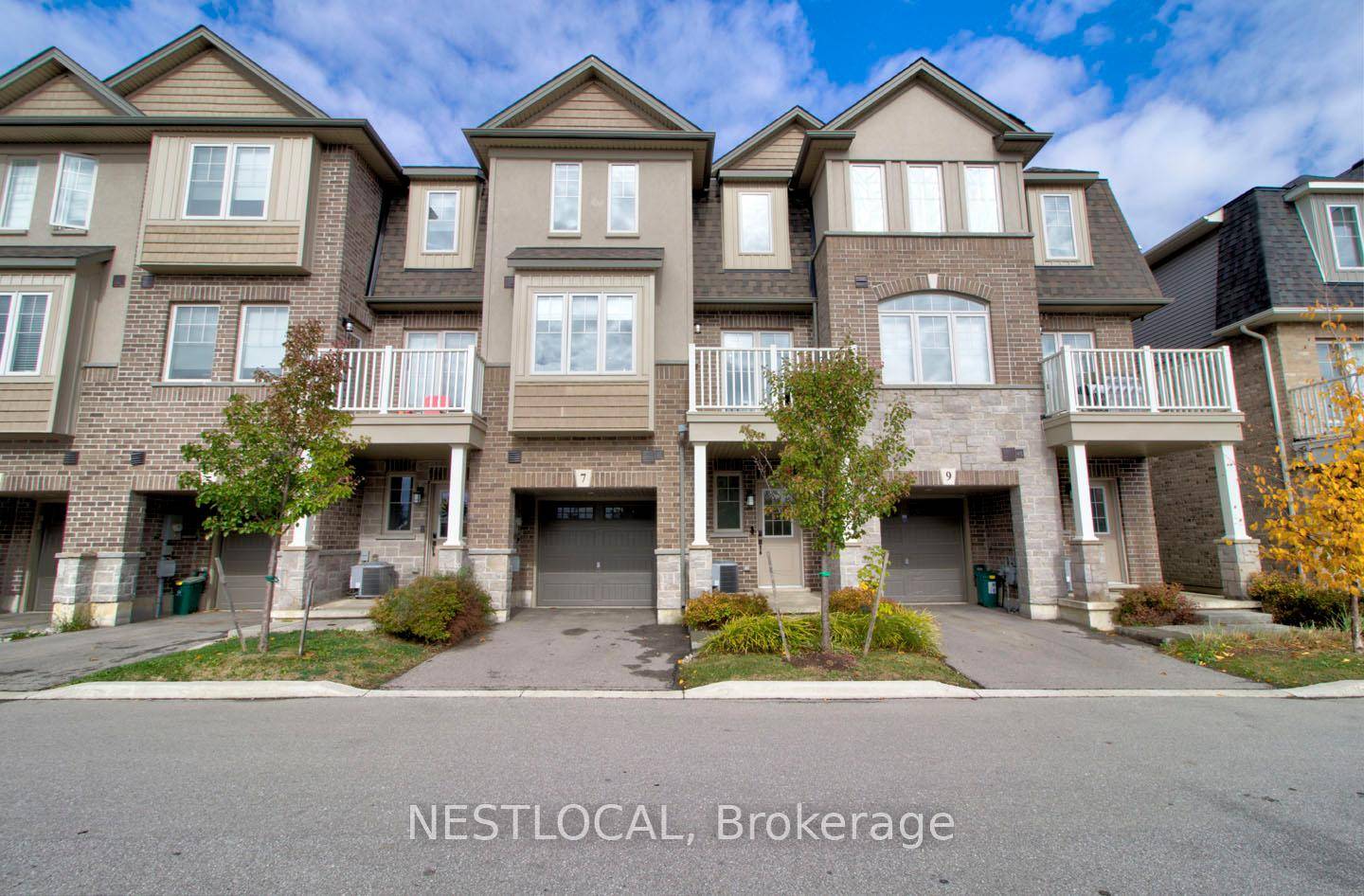 Welcome to 7 Pim Lane, a stunning 3 storey freehold townhome nestled in the heart of Ancaster Meadowlands, offering over 1, 400 square feet of modern elegance.