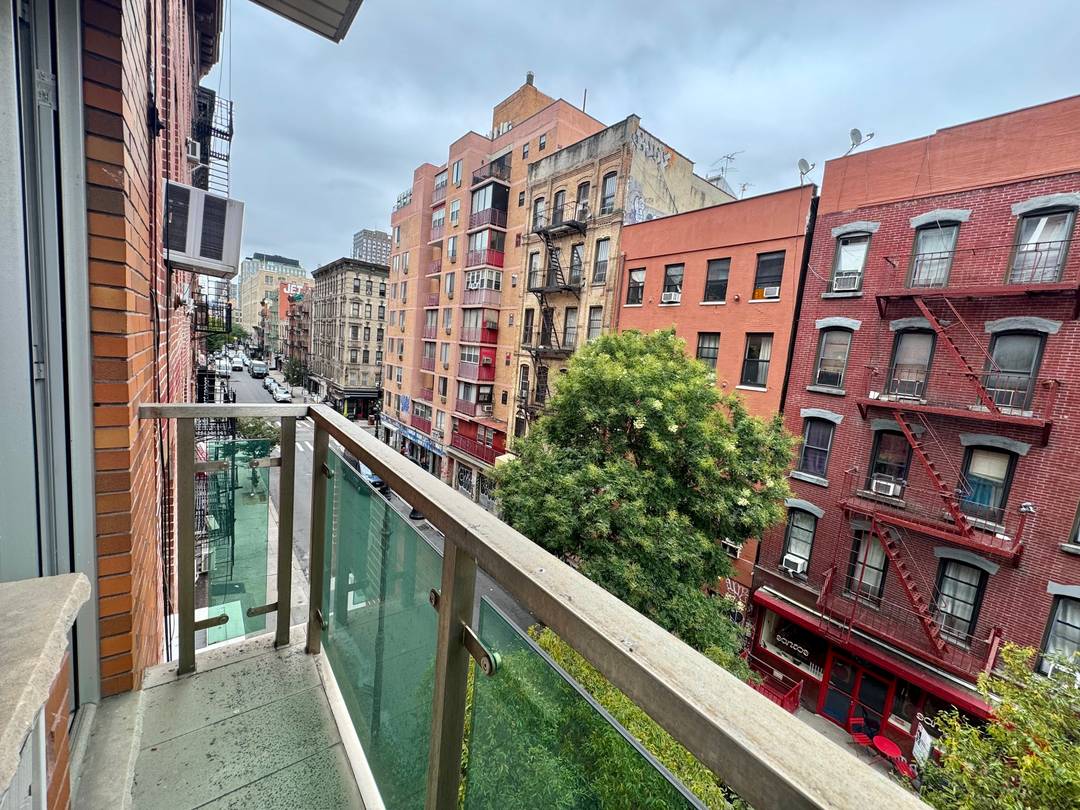 This one bedroom home is a rare find, featuring not just one, but two private outdoor spaces.