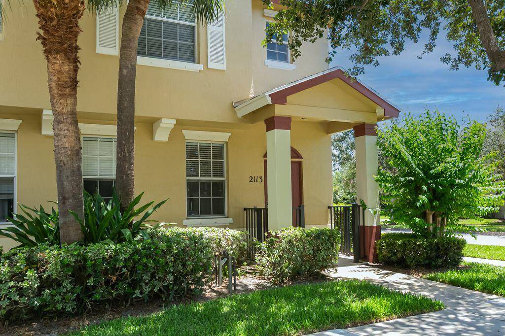 Beautiful unit located across from community pool end unit.